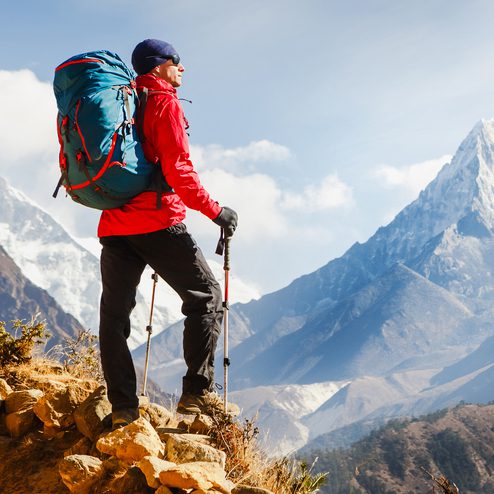 man hiking on a mountain sabx